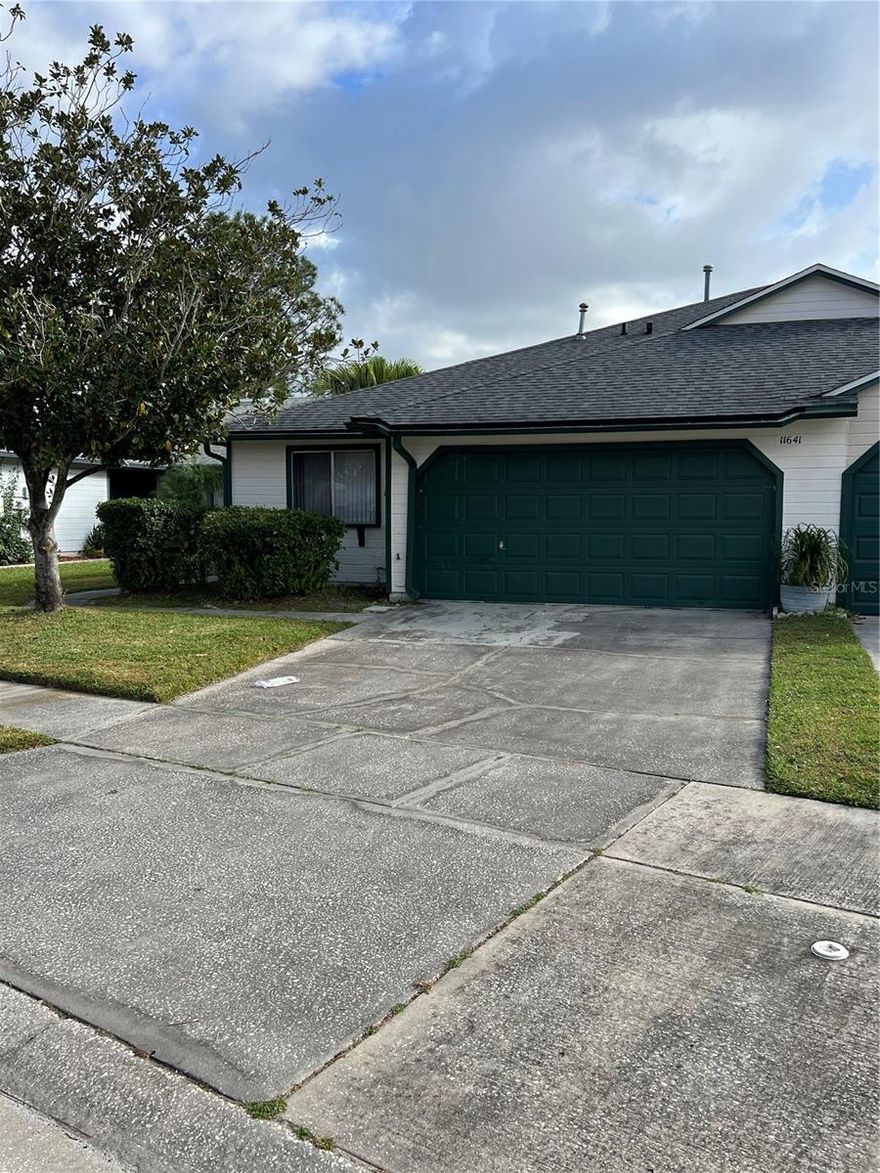 Beautiful home 3/2 with screened enclosed patio and unique atrium that brings in great natural lighting. New exterior and interior paint 2023, new tiled floor in primary bedroom and bathroom with vanity and vanity light in 2022, roof 2018. Garage door replace 2018, A/C was new in 2016, water heater and gas line 2013. Community pool nearby for "The Village" of Whisper Lakes only. Whisper Lakes has recreation facilities, playground, parks and near lots of restaurants and shopping. Good for investor or handy man.