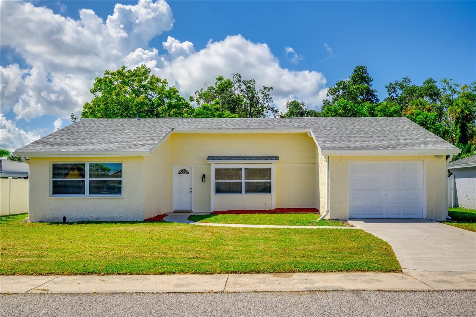 This is truly one of the nicest and best-priced homes available in Holiday—fully renovated with modern finishes and upgrades that set it apart from the rest. Featuring 3 bedrooms and 2 bathrooms, this home has been thoughtfully updated from top to bottom. The brand-new kitchen boasts shaker cabinets, granite countertops, and stainless steel appliances, while luxury vinyl plank flooring flows seamlessly throughout for a stylish and durable finish. The spacious split floor plan offers a private master suite with its own beautifully remodeled en suite bath. With a brand-new roof and new A/C, you’ll have peace of mind for years to come. Outside your door, enjoy Florida’s lifestyle with nearby beaches, boating, and recreation at Anclote River Park and Fred Howard Park. With down payment assistance available from the seller, this home delivers unbeatable value. Don’t miss your chance to own the best renovated home in Holiday—schedule your private showing today before it’s gone!