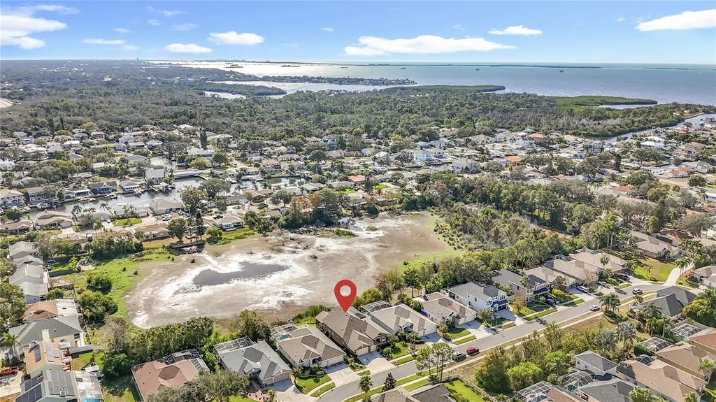 Photo of 4961 W Breeze Circle, Palm Harbor, FL 34683 (MLS # TB8453071)