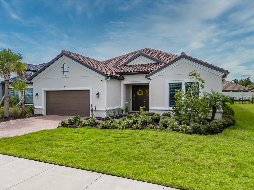 Photo of 4727 Freccia Loop, Wesley Chapel, FL 33543 (MLS # TB8545830)