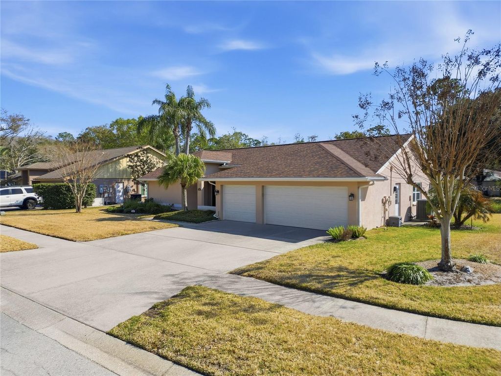 Photo of 5860 Windermere Drive, Palm Harbor, FL 34685 (MLS # TB8482741)