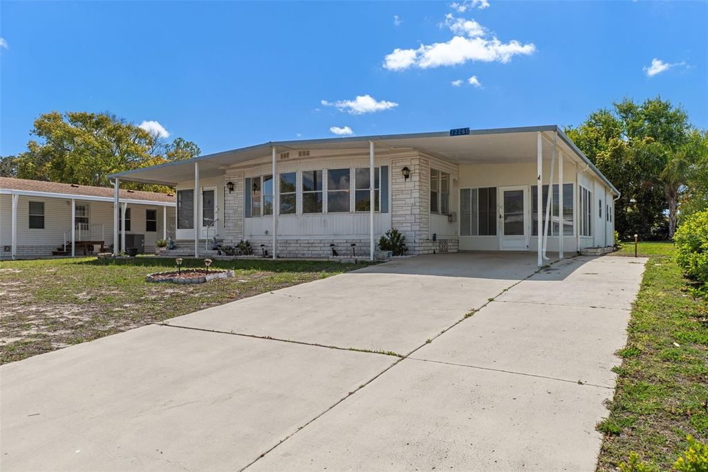 Photo of 12260 Hallmark Avenue, Brooksville, FL 34613 (MLS # TB8490103)