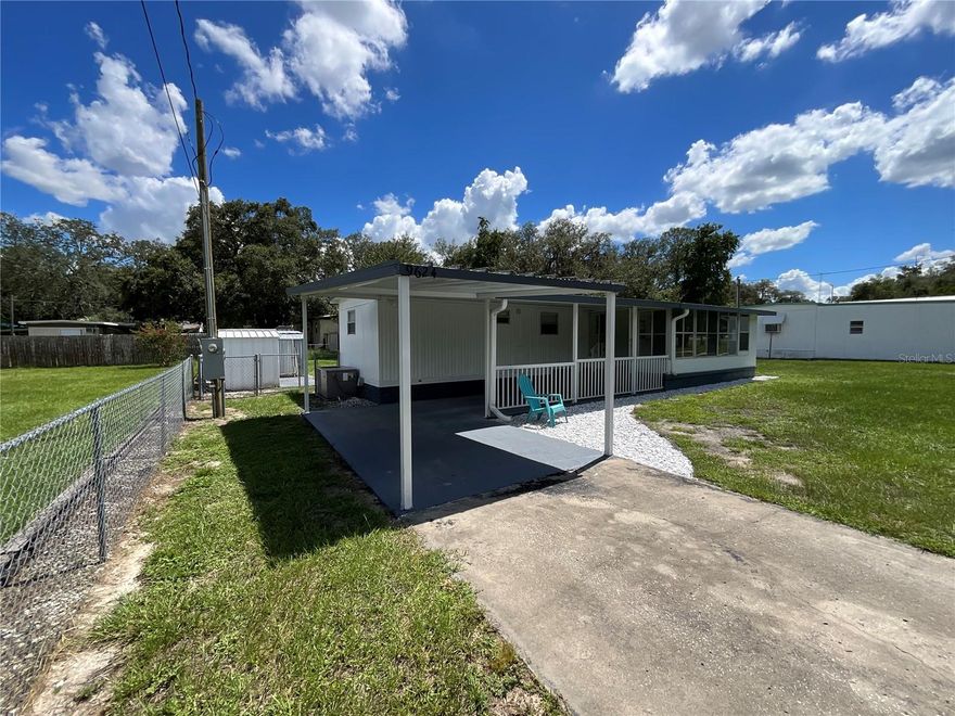 A MUST SEE This home has been renovated.  Perfect for the extra company arriving for visit.  Location walk to VA , Publix, Gas, More shopping.
