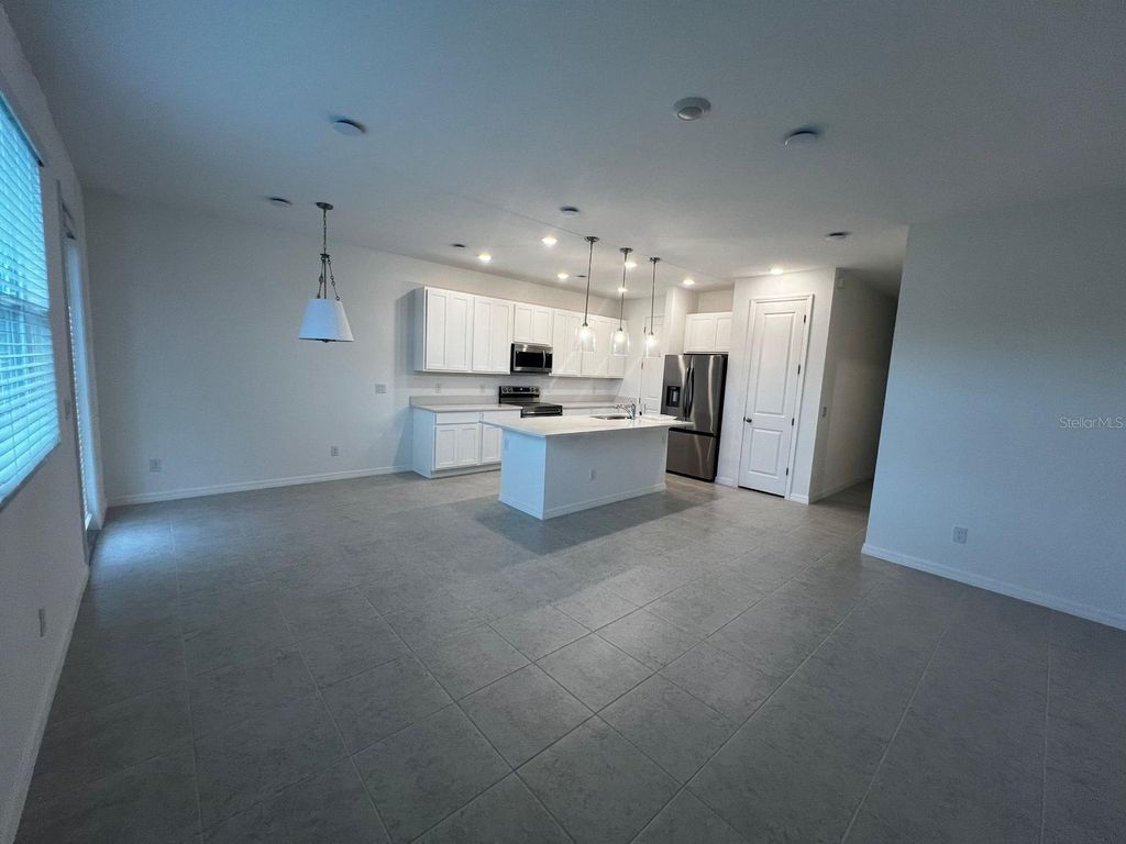 Photo of 741 Longboat Drive, Davenport, FL 33896 (MLS # S5143634)