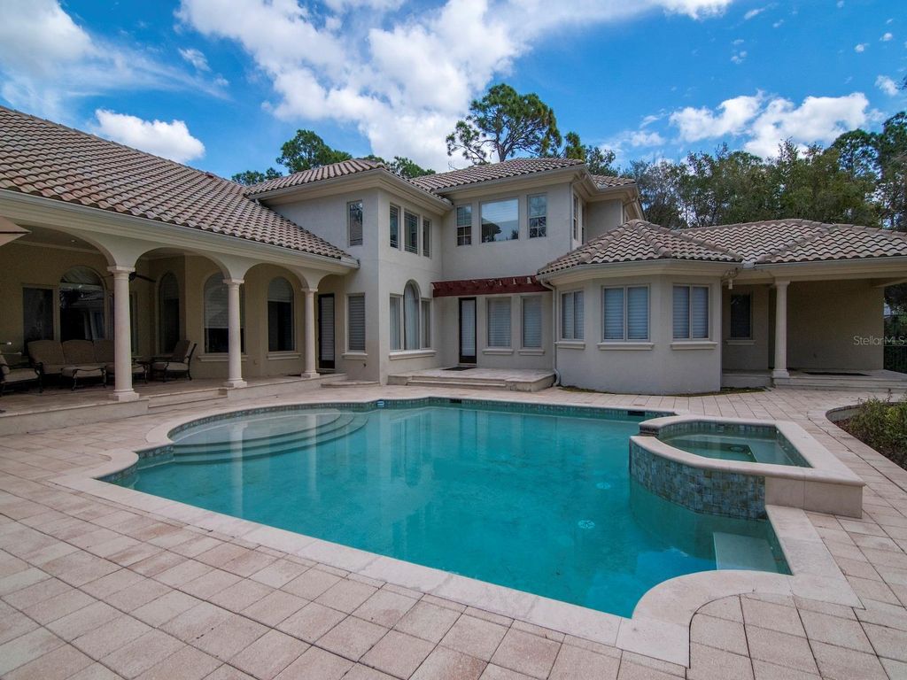 Photo of 18901 Lakes Edge Way, Odessa, FL 33556 (MLS # TB8468383)