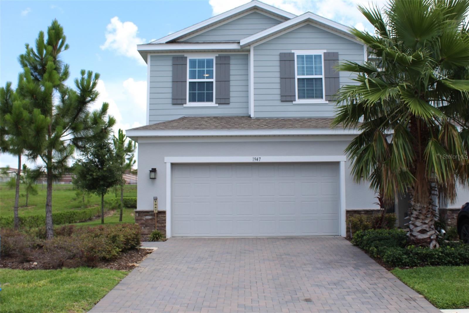 Welcome to this stunning end-unit townhome located in the highly desirable Holden Ridge community located in Minneola. Sitting on a premium lot, this spacious and modern 3 bedroom, 2.5 bathroom home combines the low-maintenance lifestyle of townhome living with the feel and privacy of a single-family home. Interior highlights include, light-filled open floor plan with upgraded finishes and neutral tones throughout. Beautiful quartz countertops throughout the home. Kitchen appliances include a white finish Samsung convection oven + range, a white finish Samsung Bespoke refrigerator, along with an over the stove microwave and upgraded dishwasher. There is a large center island with perfect seating for 3-4, a deep single tub sink with removable faucet. Upstairs is the primary suite featuring tray ceilings, ceiling fan, a large walk-in closet, a second decent size closet, and an en suite bath with double sinks and large vanity with glass-enclosed shower. Two additional bedrooms plus a flex loft space ideal for a home office or playroom along with a convenient upstairs laundry room/closet. Exterior and lot features include an end-unit offering additional windows, natural light, and only one shared wall. Located on a premium lot with a larger side yard, with no side unit or rear units/neighbors. There is a 2-car garage with ample driveway parking and an installed 240 volt plug for convenient level 2 EV charging. This is all located in a peaceful, newer construction community with sidewalks and well-kept surroundings just minutes from the Florida Turnpike, Hwy 27, and Hwy 50 for easy commuting. It's close to top-rated Lake County schools, parks, shopping, restaurants, and medical facilities, including nearby attractions such as the Minneola Athletic Complex, Lake Hiawatha Preserve, and Clermont's waterfront trail system. This home has it all - space, style, location, and low-maintenance living on one of the best lots in the neighborhood. The listing agent is also the owner and must accompany all showings.
Interested tenants, please use this link to complete your application - https://www.rentapplication.net/valiantrealtygroup - For more information contact the listing agent to schedule a private tour or request additional details.