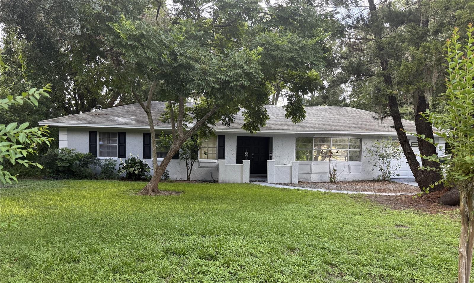 Gorgeous 3 bedroom 2 bath 1 car garage pool home completely renovated and located in the desirable Carrollwood area. You'll love this one as it comes with a newer roof, new ceramic tiles throughout, lots of kitchen cabinet space, granite counter tops, high end appliances, fenced in yard, screened in lanai, located on a cul-de-sac, and an electric car charger in garage. NO HOA fees. Excellent and convenient location! Popular lake across the street, Nearby bus stop, close to shopping mall, hospital, schools, restaurants, parks, easy interstate access to downtown, airport, beaches and many other amenities. Farmers market every Sunday that is walkable. Call for more info.