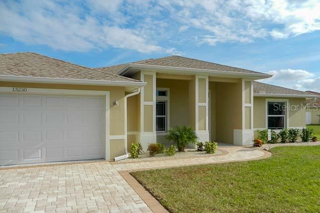 Under Construction. New Construction, under construction. Step into Florida living at its finest with this stunning 3-bedroom, 2-bathroom, 1608 sq. ft. new construction home located in the heart of the sought-after Rotonda West Golf Community. Featuring a spacious open floor plan, this home offers the perfect blend of modern design and everyday comfort, ideal for entertaining or relaxing in style.
Backed by a peaceful greenbelt, your backyard retreat offers privacy and serenity, while being just minutes from several golf courses. Whether you’re an avid golfer or simply love scenic walks and neighborhood charm, this location delivers.
Built with safety and style in mind, this home includes:
Hurricane impact windows, sliding glass doors, front entry, and garage door
Energy-efficient design and premium construction
Elegant finishes and quality craftsmanship throughout
Still time to make it yours! Buyers can choose cabinets, countertops, and interior paint colors to perfectly match your taste and lifestyle.
Don’t miss this incredible opportunity to own a brand-new, customizable home in one of Southwest Florida’s most desirable golf communities. Schedule your tour today and start building your future in Rotonda West! Room sizes approximate. Rendering for illustrative purposes only, features may differ. Photos on listing are of a completed home, colors and features may vary. This home does not have a paver driveway.