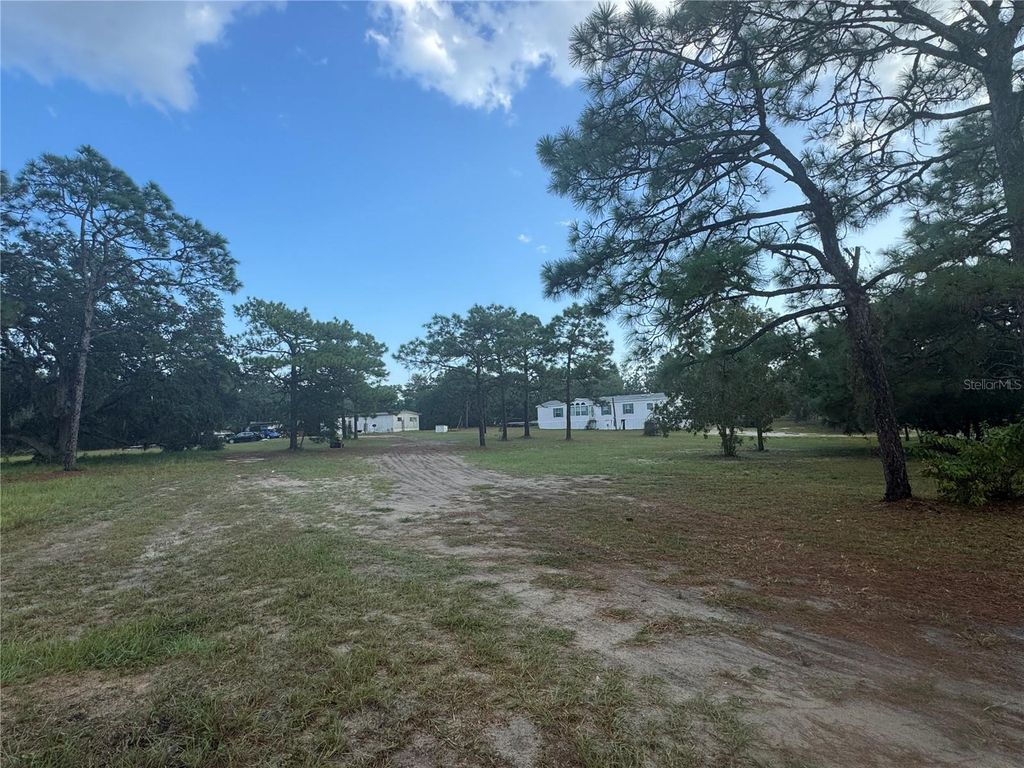 Photo of 16724 Gopher Hills Lane, Hudson, FL 34667 (MLS # W7879194)