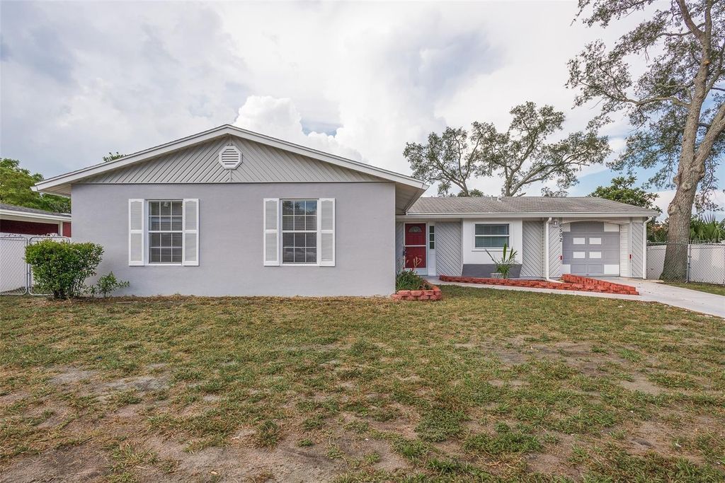 Photo of 6502 Spring Hill Drive, Spring Hill, FL 34606 (MLS # TB8493612)