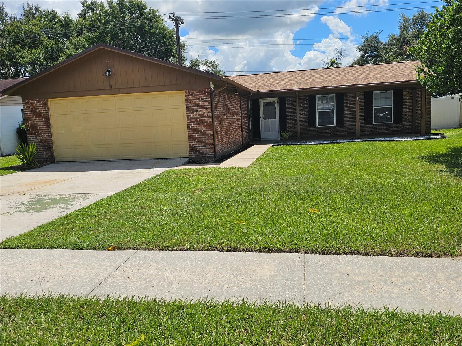 WELCOME TO THIS CHARMING SOUTHEAST LAKELAND HOME!! 3-bedroom, 2-bathroom brick and block home with a large 2-car garage, perfectly situated in the heart of Central Lakeland with NO HOA! Nestled in a well-established neighborhood. This home has been refreshed with NEW SHINGLES, fresh interior paint, and new blinds. Plus, the flooring is all ceramic tile throughout making it truly move-in ready. The inviting screened patio is perfect for relaxing or entertaining, while the PVC privacy fence provides peace of mind and a private backyard retreat.
Conveniently located near Grove Park Shopping Center and just minutes from Lake Hollingsworth, downtown Lakeland, the City Golf Course, YMCA, city tennis courts, dog park and just minutes to Southeastern University. This home offers both comfort and accessibility with the Polk Parkway nearby, commuting to Tampa or Orlando is a breeze. Medical facilities and restaurants are also near by. Priced to sell quick! Call today to make this your home.