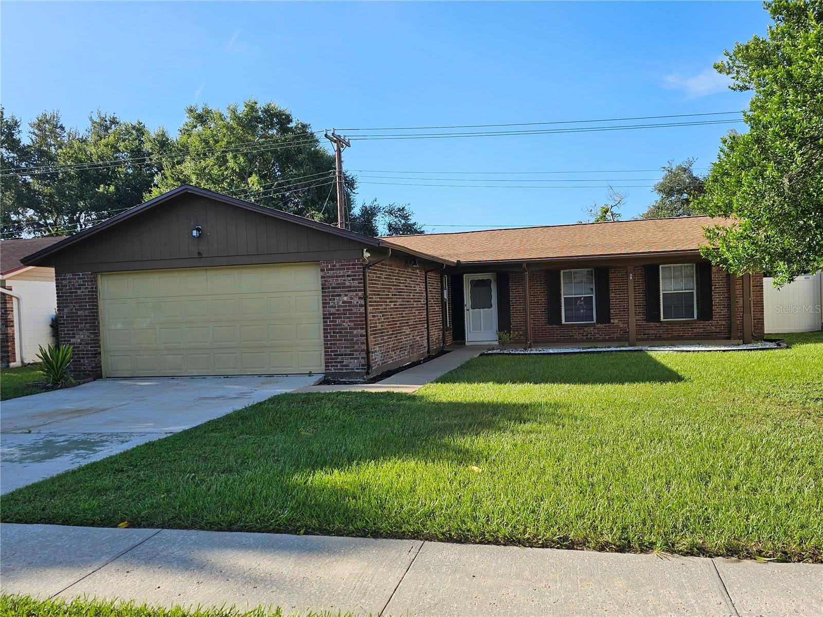 WELCOME TO THIS CHARMING SOUTHEAST LAKELAND HOME!! 3-bedroom, 2-bathroom brick and block home with a large 2-car garage, perfectly situated in the heart of Central Lakeland with NO HOA! Nestled in a well-established neighborhood. This home has been refreshed with NEW SHINGLES, fresh interior paint, and new blinds. Plus, the flooring is all ceramic tile throughout making it truly move-in ready. The inviting screened patio is perfect for relaxing or entertaining, while the PVC privacy fence provides peace of mind and a private backyard retreat.
Conveniently located near Grove Park Shopping Center and just minutes from Lake Hollingsworth, downtown Lakeland, the City Golf Course, YMCA, city tennis courts, dog park and just minutes to Southeastern University. This home offers both comfort and accessibility with the Polk Parkway nearby, commuting to Tampa or Orlando is a breeze. Medical facilities and restaurants are also near by. Priced to sell quick! Call today to make this your home.