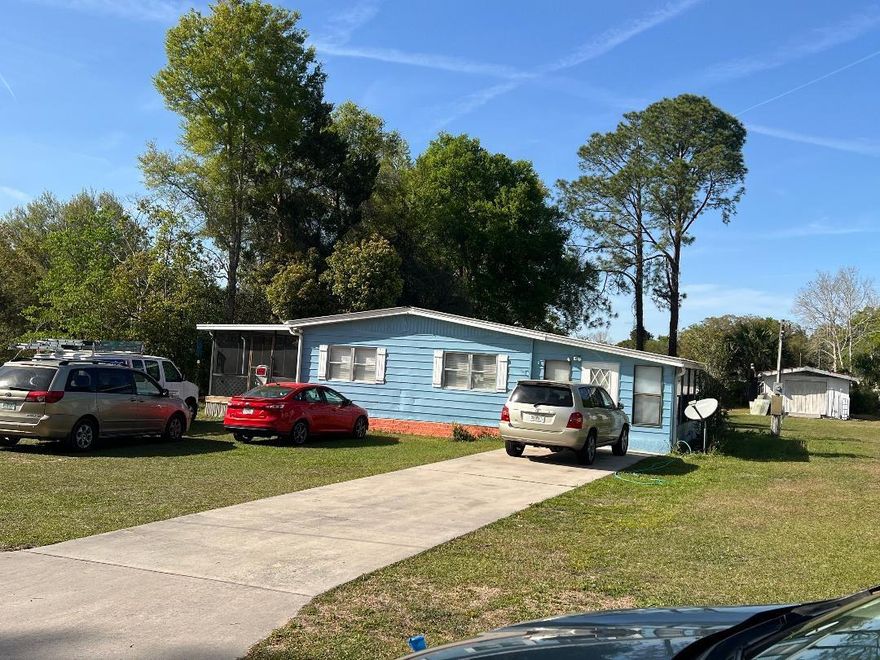 Manufactured home with land ,3 bedroom 2 bathroom,dining room ,living room ,kitchen ,enclosure porch ,spacious yard, Nice Lot .50 ,WOULD MAKE AN EXCELLENT RENTAL PROPERTY OR HOME. New floor, fresh painting close to schools, parks, shopping and major roads.