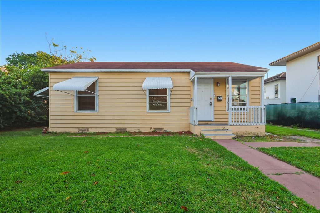 Photo of 726 Forest Hill Boulevard, West Palm Beach, FL 33405 (MLS # O6369017)