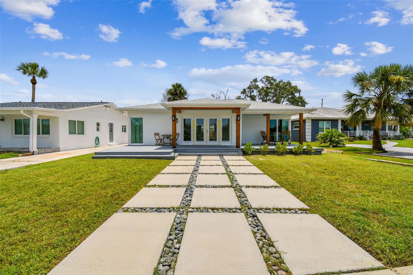 Welcome to 315 S Spring Blvd, a beautifully renovated waterfront home located in the heart of historic Tarpon Springs. This property offers stunning curb appeal, breathtaking views of Whitcomb Bayou, and thoughtfully selected upgrades throughout.
Inside, you’ll find an oversized living room that flows into a spacious open-concept kitchen, ideal for entertaining. The kitchen features quartz countertops, LG stainless steel appliances—including a gas range with built-in air fryer—pristine cabinetry, exposed wood shelving, and a stylish backsplash. The primary suite includes a luxurious en suite bath with a double-headed shower for a spa-like experience.
Major updates include a 2023 roof, new luxury flooring, new windows, a new air conditioning system, a new gas water heater, and a new washer and dryer. The home also features mounted and hardwired security cameras on all four corners, offering peace of mind and modern security.
Out back, the beautifully maintained yard includes a sparkling pool with a new pump, a spacious patio, and low-maintenance composite decking. The back porch is already plumbed for propane, making it easy to hook up a grill and enjoy outdoor cooking. Relax on the charming front porch while soaking in the views of the bayou.
Under the home, two sump pumps and a dehumidifier keep the crawlspace dry year-round. The encapsulation system—installed and warrantied by Alpha Foundations—is fully transferable to the new owner for added confidence.
Located just minutes from the Sponge Docks, parks, shops, and restaurants, this home blends historic charm with modern convenience.
Don’t miss this opportunity to own a move-in ready home in one of Florida’s most desirable waterfront neighborhoods.