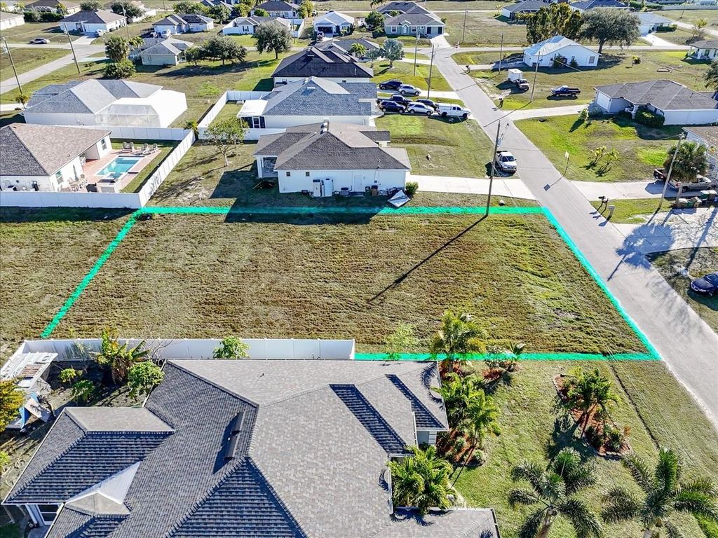 Photo of 1317 NW 9th Terrace, Cape Coral, FL 33993 (MLS # C7521134)