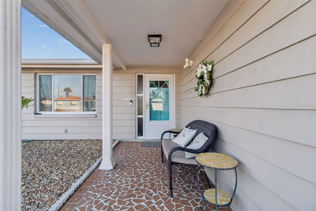 Photo of 4940 Picture Avenue, Holiday, FL 34690 (MLS # TB8471735)