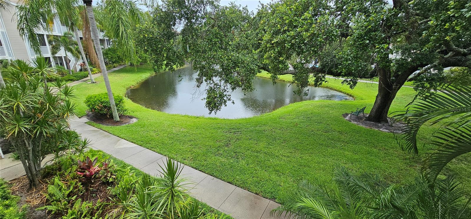 Central Park Vacation Rental Near Downtown Sarasota. $3000 Off Season (Nov-Dec 2025) or $4500 Season (Jan-Mar 2026). This gorgeous 2 bedroom, 2.5 bath property is situated near the edge of downtown Sarasota. It is completely updated and ready for a season or off season tenant. The relaxing views from this unit are of the beautiful lake and just a short walk to the clubhouse, pool, pickleball/tennis court and fitness room. Enjoy a community dock on Hudson Bayou granting access to Sarasota Bay. A brief stroll will lead you to downtown Sarasota, Selby Gardens, Bayfront Park at Marina Jacks, as well as various shopping and dining options. Hop on your bicycle and within moments, you'll find yourself at Payne Park, the starting point of the Legacy Trail. Within a short distance: 3.7 miles to St. Armand's with shopping, dining and entertainment and Lido Key Beach to get a tan or enjoy the sunset. Ted Sperling Park on Lido Key offers nature trails and kayak routes amidst the mangroves a bit further south on the Key. Just 6.4 miles to Siesta Key voted one of the best beaches in the US with beautiful white sand beaches and more shopping and dining choices. If you seek an exciting, vibrant downtown lifestyle under the sun, this presents an ideal opportunity. King size bed in master and two queen size beds in guest bedroom. All utilities, internet, cable with Smart TV's are included. Off street open parking in the community available. Sorry no pets permitted. 13% sales and tourism taxes apply to any rental less than 6 months.
