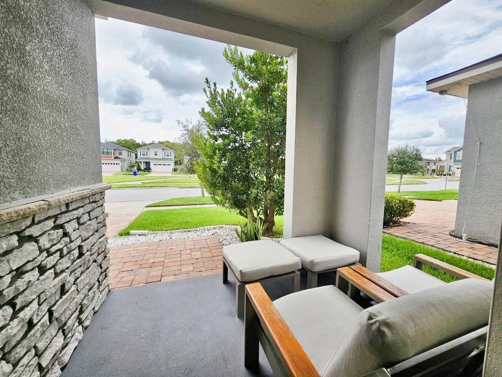 Photo of 2410 Riverbank Cove, Kissimmee, FL 34741 (MLS # O6452477)