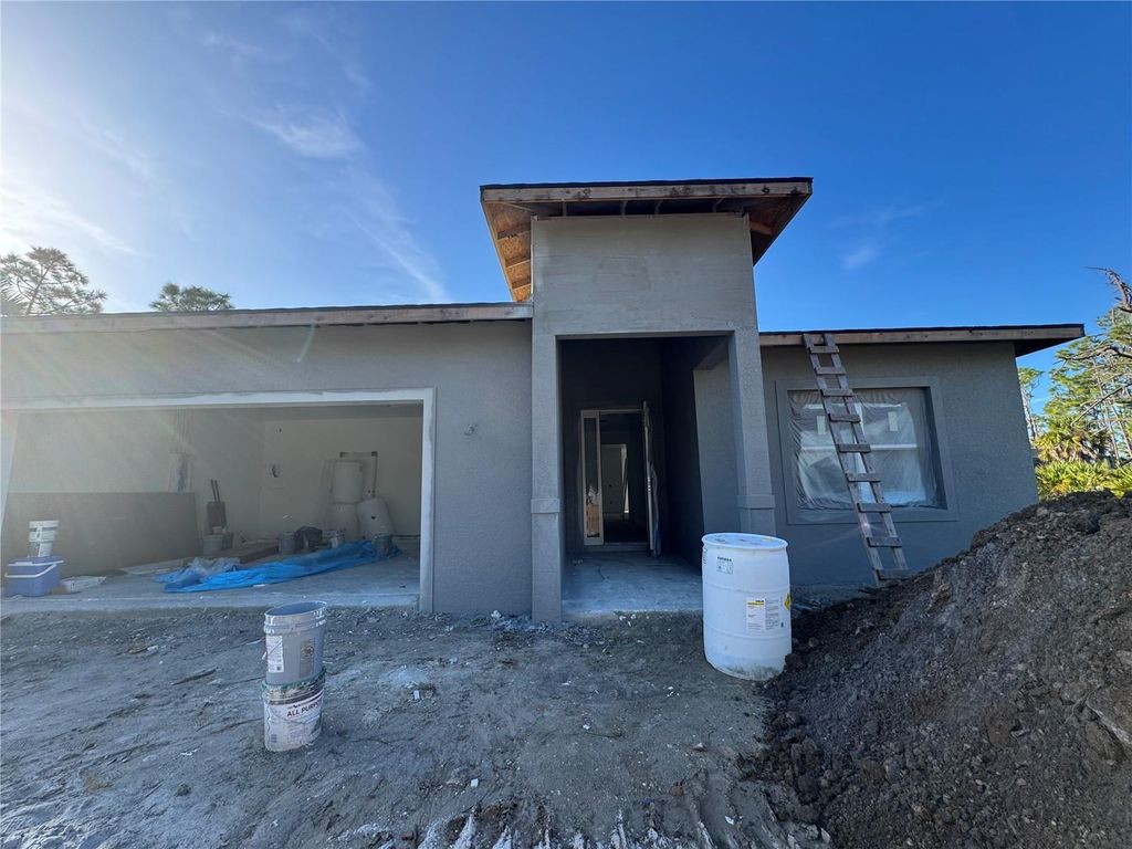 Photo of 12061 Atoll Avenue, Port Charlotte, FL 33981 (MLS # O6384612)