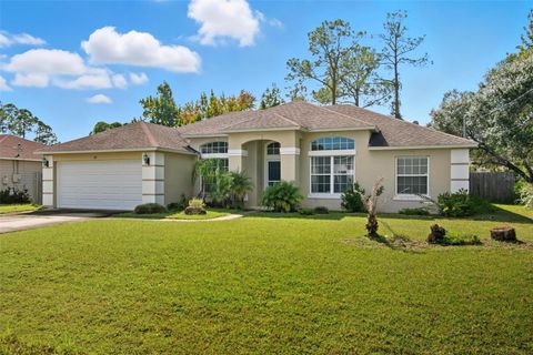 Photo of 22 Pinetree Drive, Palm Coast, FL 32164 (MLS # FC313401)
