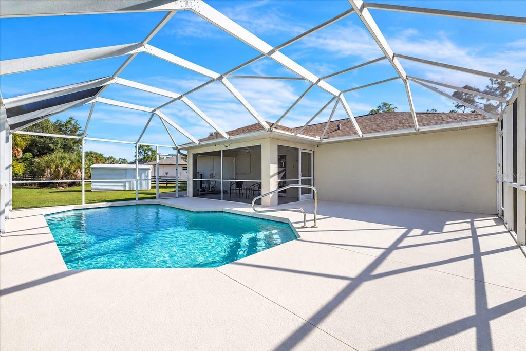 Photo of 1091 Luau Street, North Port, FL 34286 (MLS # C7532289)