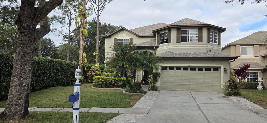 Photo of 4217 Fishermans Lake Drive, Lutz, FL 33558 (MLS # W7881344)