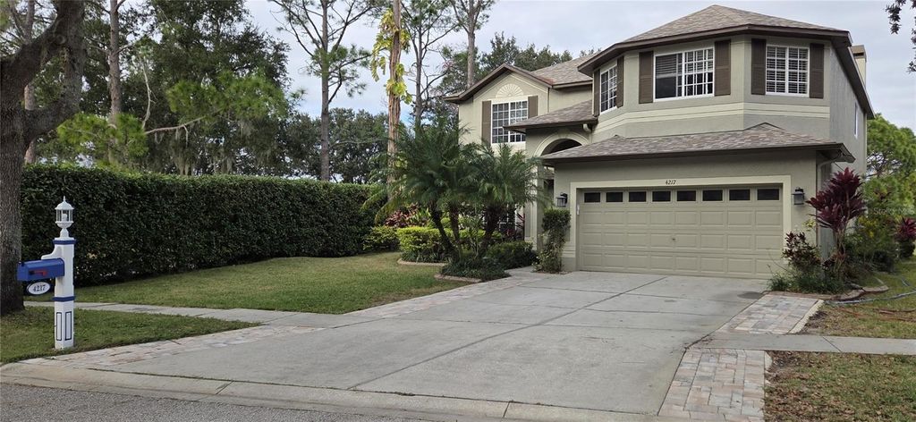 Photo of 4217 Fishermans Lake Drive, Lutz, FL 33558 (MLS # W7881344)