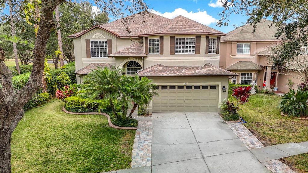 Photo of 4217 Fishermans Lake Drive, Lutz, FL 33558 (MLS # W7881344)