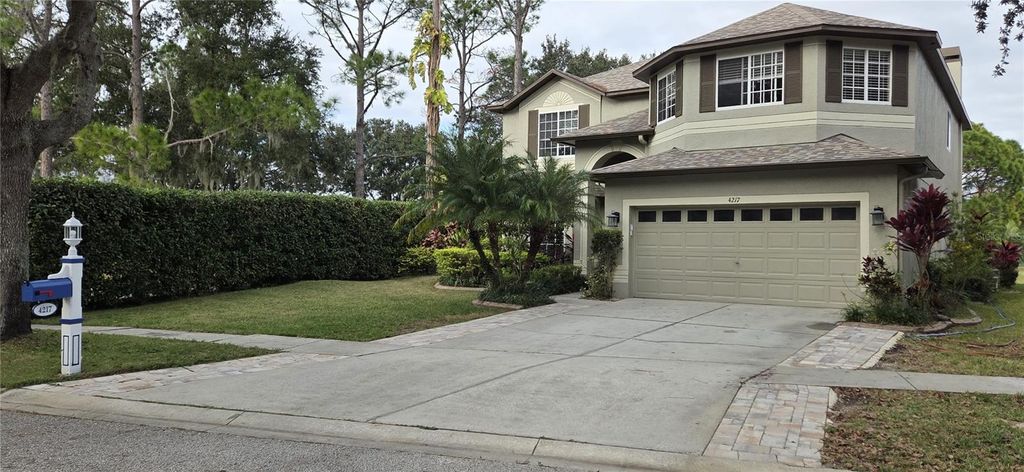 Photo of 4217 Fishermans Lake Drive, Lutz, FL 33558 (MLS # W7881344)