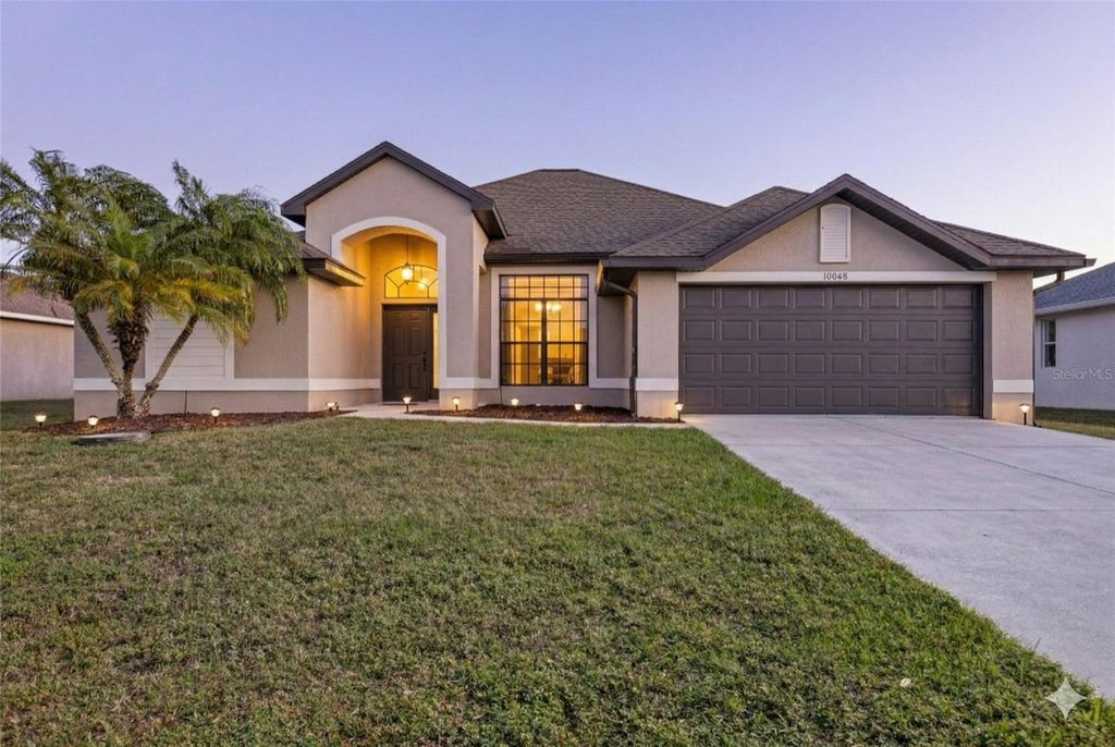 Photo of 10048 Lebanon Drive, Port Charlotte, FL 33981 (MLS # TB8466582)