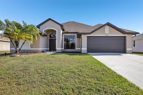 Photo of 10048 Lebanon Drive, Port Charlotte, FL 33981 (MLS # TB8466582)