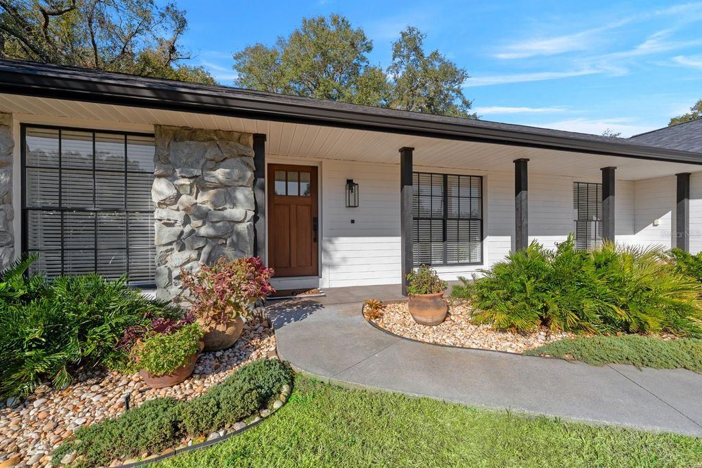 Photo of 2525 Laurelwood Lane, Valrico, FL 33596 (MLS # TB8474417)