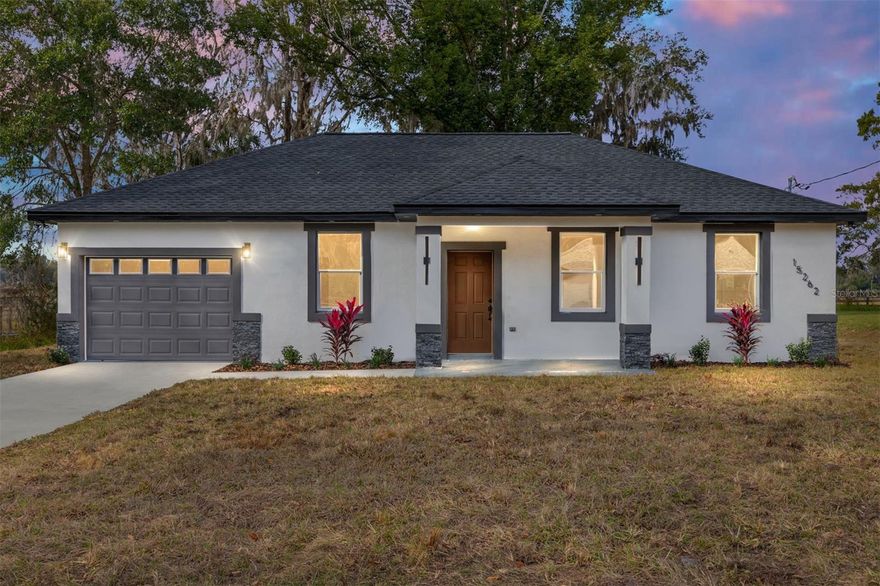 Under Construction. Nestled at the end of a private dead-end road, this brand-new 3-bedroom, 2-bath home showcases attractive exterior stonework and exterior lighting. Step inside to find beautiful tile flooring flowing seamlessly throughout the home, enhanced by tray ceilings in the bedrooms. The kitchen features upgraded cabinetry and opens to a spacious living area, while the stunning backyard view creates the perfect setting to relax or entertain. Thoughtfully designed with quality finishes, this home offers comfort, style, and privacy.