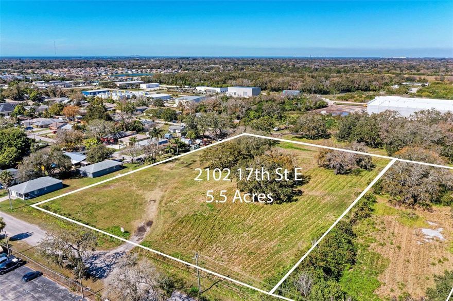 5.5 Acres, Zoning District LM, Light Manufacturing, Future Land Use IL, Industrial Light, Cleared with some trees. Ideal for FLEX-SPACE Multi-Tenant Warehouse with high ceilings & office space or RV/BOAT Storage, or Light Manufacturing Warehouse. etc.