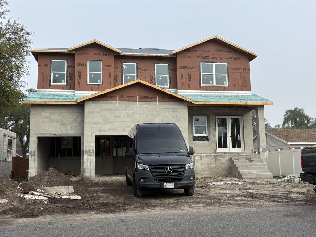 Photo of 3025 W Asbury Place, Tampa, FL 33611 (MLS # TB8461347)