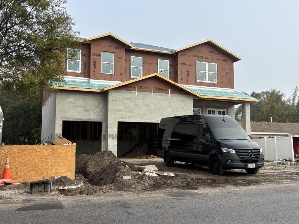 Photo of 3025 W Asbury Place, Tampa, FL 33611 (MLS # TB8461347)