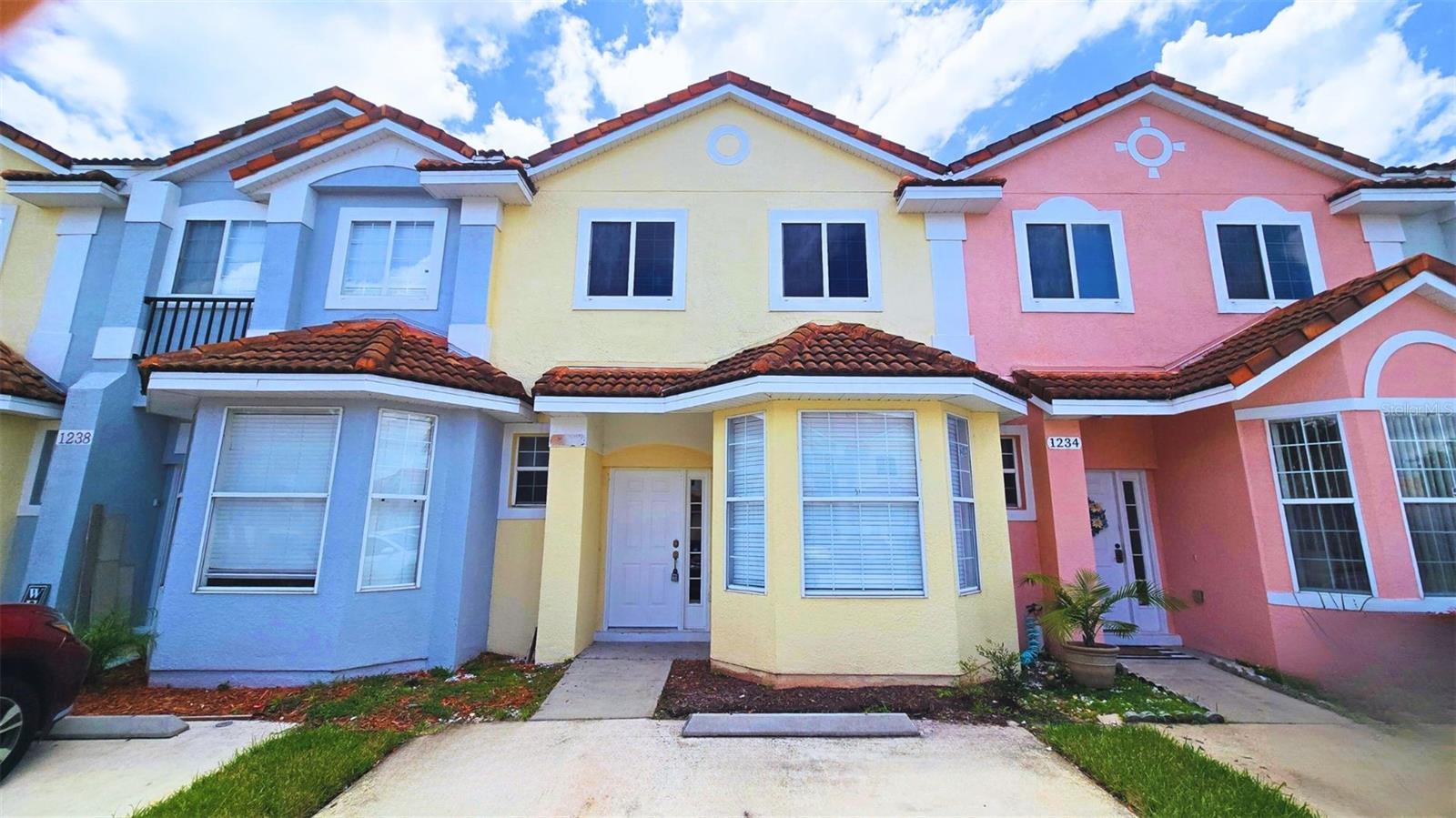 Available now! This beautifully maintained 3-bedroom, 2.5-bathroom townhome offers spacious living in a gated, resort-style community just minutes from Disney parks, shopping, dining, and top-rated golf courses. The home features a bright, open layout with stainless steel appliances, generously sized bedrooms and bathrooms, and a large screened-in patio—perfect for relaxing or entertaining. Enjoy access to fantastic amenities including a clubhouse, resort-style pool, fitness center, tennis courts, playgrounds, picnic areas, and scenic walking trails. Don't miss your chance to live in comfort and style near Orlando's top attractions! HOA approval required. INQUIRE NOW!