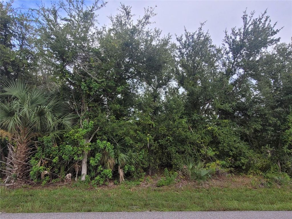 Photo of 9653 President Circle, Port Charlotte, FL 33981 (MLS # D6138139)