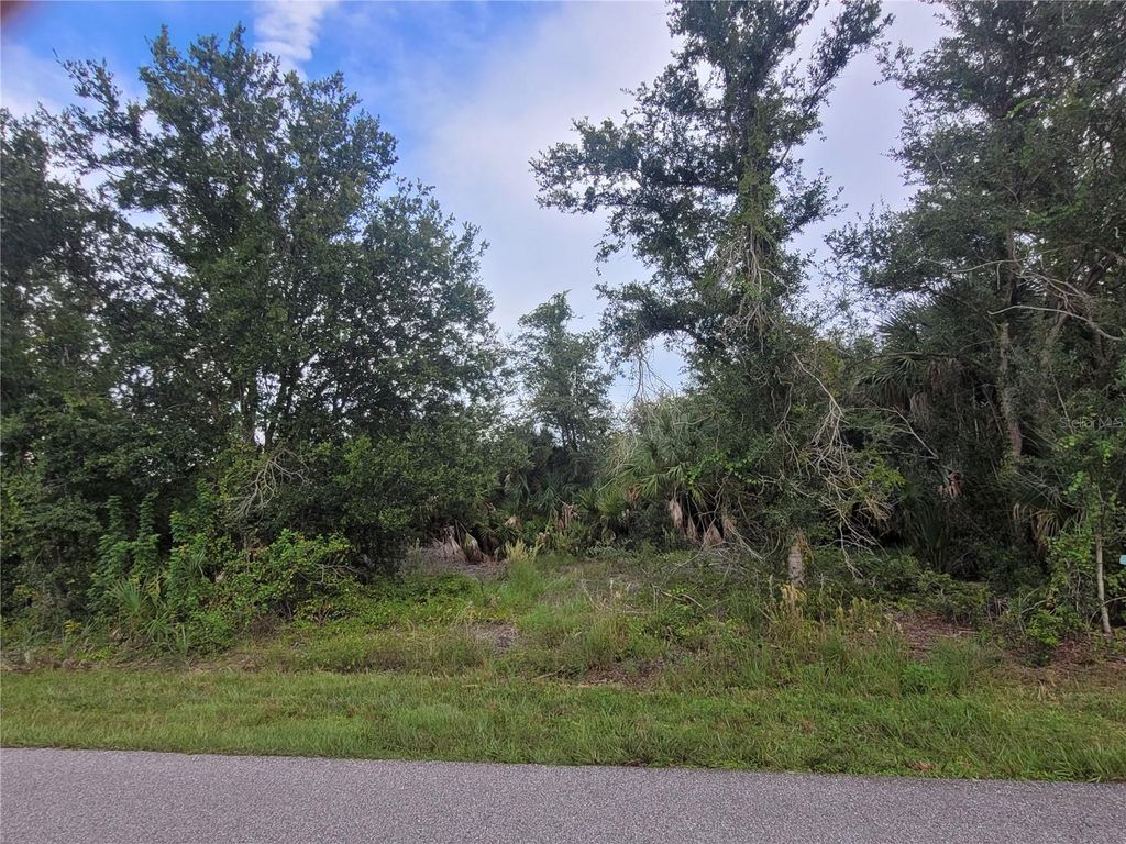 Photo of 9653 President Circle, Port Charlotte, FL 33981 (MLS # D6138139)