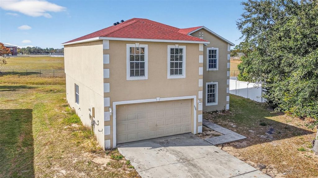 Photo of 1906 Lakeview Lane, Kissimmee, FL 34759 (MLS # O6370883)