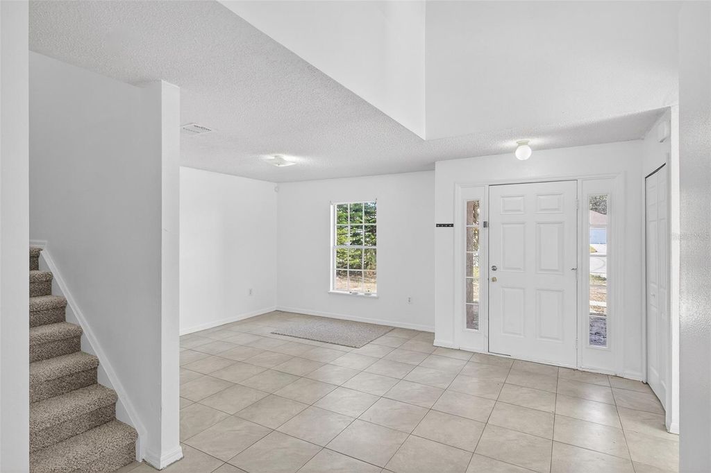 Photo of 1906 Lakeview Lane, Kissimmee, FL 34759 (MLS # O6370883)