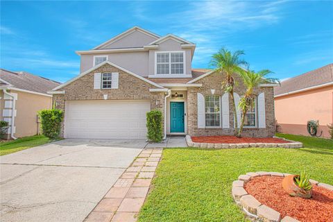 Photo of 10014 Medallion Bluff Lane, Orlando, FL 32829 (MLS # O6344417)