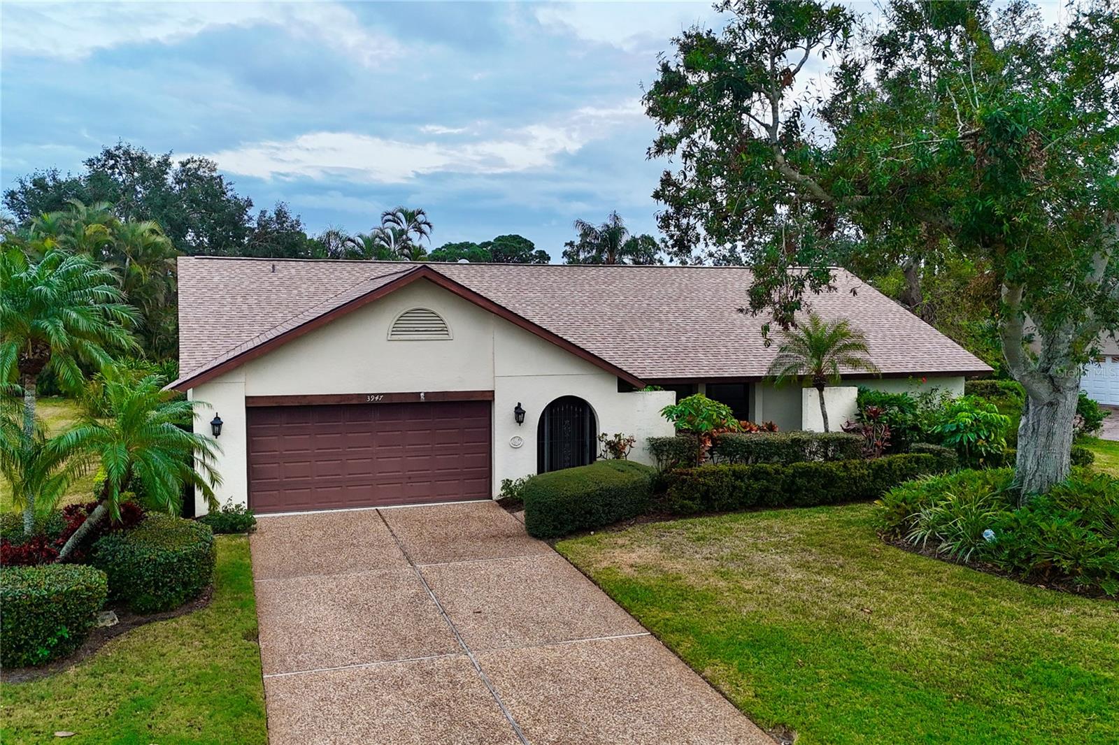 Discover your tropical paradise in the highly sought-after Country Place neighborhood of Sarasota, Florida. Just a short drive to the world-renowned Siesta Key Beach, this 4-bedroom, 2-bathroom single-family home offers 2,696 square feet of potential in an unbeatable location. Step outside to your private oasis, complete with a large pool and patio enclosed by a pool cage. The beautifully landscaped backyard, surrounded by a full privacy fence, evokes the serenity of a tropical retreat, perfect for entertaining or relaxing with family. Inside, the home features spacious living areas and a layout brimming with potential. With its generous size, prime location, and family-friendly neighborhood, this property is an ideal canvas to create your dream home. Whether you're looking for a quiet haven or a vibrant family space near top beaches and amenities, this home offers it all. Don't miss this rare opportunity, schedule your showing today!