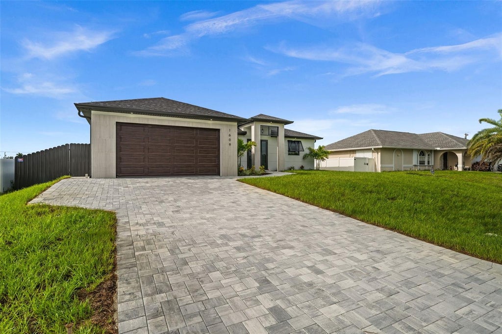 Photo of 1609 NW 16th Terrace, Cape Coral, FL 33993 (MLS # TB8534253)