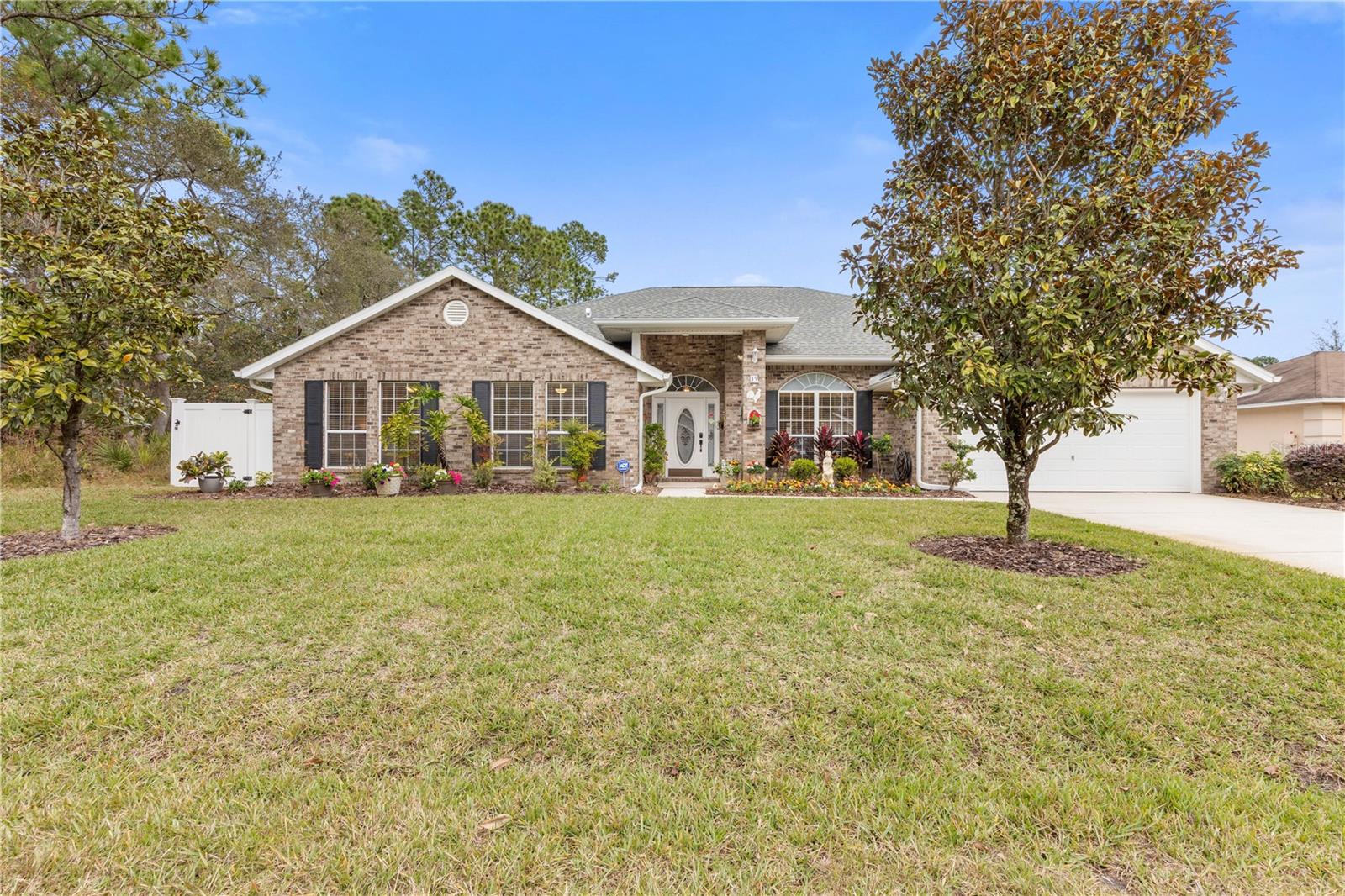 Welcome to your dream home! This well-maintained 4-bedroom, 3-bathroom, 2 car garage gem boasts nearly 3,000 square feet of living space, nestled on a peaceful and quiet street. From the moment you arrive, the charming brick exterior and manicured landscaped surroundings set the tone for the quality awaiting you within.
Step through the front door and be greeted by the inviting open floorplan and soaring ceilings that enhance the sense of space. The large main suite is a true retreat, featuring a tray ceiling, his and hers walk-in closets, double vanities, and a separate tub and walk-in shower.
The heart of this home is undoubtedly the expansive island kitchen designed to please any chef. Adorned with newer appliances (including a double oven and Bosch dishwasher) and brand-new Luxury Vinyl Plank (LVP) flooring, the kitchen is both stylish and functional. A walk-in pantry, breakfast nook, and easy access to the garage add to the convenience and charm.
The spacious family room is a cozy haven with a wood-burning fireplace and a door leading to the enormous 40x11.5 covered and screened patio. Step outside and take in the view of the meticulously manicured white vinyl fenced backyard, offering ample space for a future pool addition. The yard remains lush year-round thanks to the irrigation system on a well.
Additional features include; Roof and AC are both from 2017, a transferable termite bond, ADT security system, double-pane windows, gutters, indoor laundry with a door to the patio, an indoor AC closet, and a washer and dryer.
Don't miss the opportunity to own this beautifully maintained home – schedule a showing today!