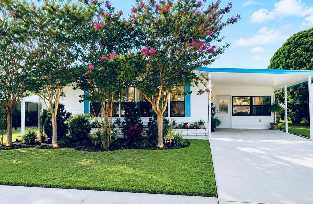 Photo of 3937 Chris Drive, Wesley Chapel, FL 33543 (MLS # TB8533517)
