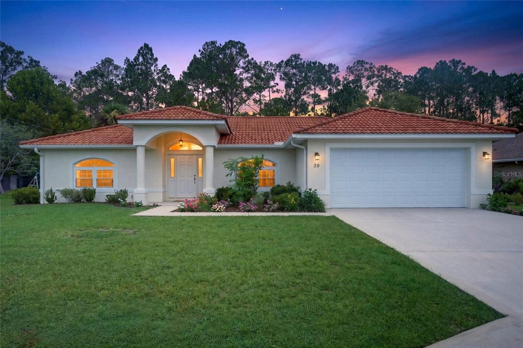 Photo of 39 White House Drive, Palm Coast, FL 32164 (MLS # FC320558)
