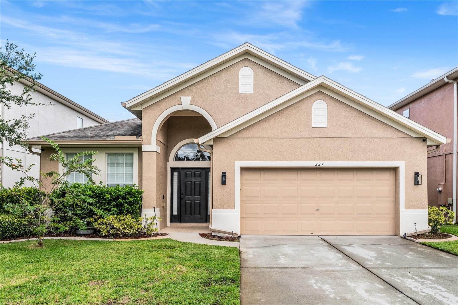 It’s rare to find an exclusive, tight-knit community where neighbors look out for one another and friendships feel more like family. That’s exactly what makes Venetian Bay so special. This charming enclave of just 90 homes is a sanctuary of warmth and connection a place where newcomers are welcomed with open arms and community pride shines on its street.
At the heart of this exceptional neighborhood is a well-designed residence built by Morrison Homes, one of the nation’s most respected and trusted builders. Known for their thoughtful floorplans and enduring craftsmanship, Morrison Homes delivers residences that are built to last ensuring peace of mind and quality living for years to come.
When you arrive, you will be greeted by an elegant elevation with undeniable curb appeal, framed by manicured landscaping and a stately front entrance that sets the tone for the sophistication inside. Step through the front door into a warm and inviting interior, where you will find a formal dining room with soaring ceilings, elegant crown molding, and abundant natural light shining through the classic Plantation Shutters.
The heart of the home is the dreamy chef’s kitchen, beautifully renovated with timeless Cinnamon Spiced cabinetry, “Giallo Ornamental” granite countertops, and a refined linen subway tile backsplash. A charming breakfast nook offers the perfect spot for casual dining or morning coffee, while the kitchen seamlessly flows into the family room an inviting space highlighted by detailed custom shutters and rich travertine flooring.
The first-floor primary suite serves as a private retreat, styled in a calming neutral palette and filled with soft, natural light. The spa-inspired bath features a luxurious Garden Tub flanked by a walk-in shower lined in on-trend tiles and stone accents, picture-frame mirrors, and an ultra-modern Sand Toned Cabinetry vanity with a perfume tower. Secondary bedrooms are also conveniently located on the first floor, each offering spacious closets and comfort for family or guests.
Upstairs, a versatile bonus room provides the ideal hangout, playroom, or study space. Complete with a built-in niche perfect for a home office or homework station, this space adapts easily to your lifestyle needs.
This home has been thoughtfully refreshed and lovingly maintained, with major systems recently replaced to ensure years of worry-free living. Outdoors, sliding glass doors lead to a serene open-air lanai and fully fenced backyard, creating a private retreat for morning coffee, evening cocktails, or lively weekend gatherings.
Beyond the home, Venetian Bay’s boutique community vibe is enhanced by its prime location. Residents enjoy top-rated Seminole County schools, as well as walking access to the River Walk with tranquil water views, charming downtown dining, and a waterfront marina. With easy access to SR-417 and I-4, you’re just minutes from Sun Rail, the Seminole Wekiva Trail, three hospitals, and the area’s finest dining, shopping, and nightlife.
This is more than a home, t’s a lifestyle in a rare community where neighbors truly care for one another. Don’t miss your chance to call Venetian Bay home.