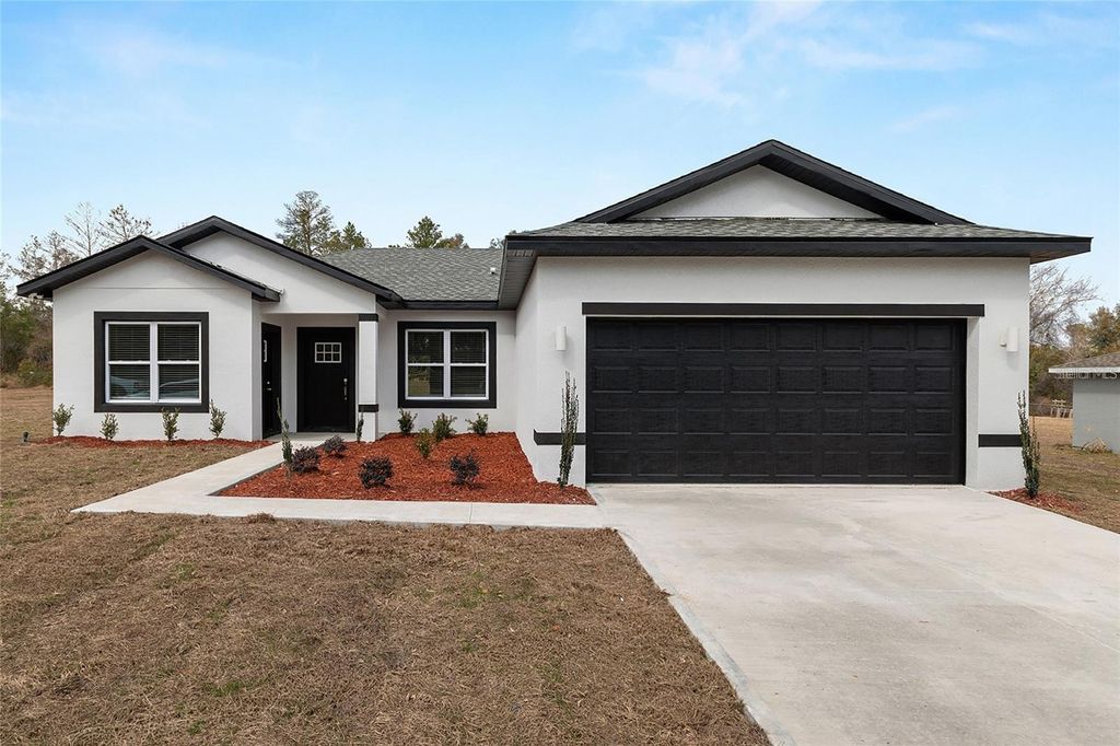 Photo of 16965 SW 50th Circle, Ocala, FL 34473 (MLS # O6387964)